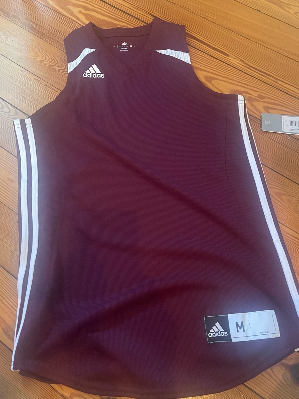 adidas light maroon softball Jersey with White Accents. NWT. Women’s medium.